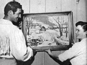 “The Range Rider” aka Jock Mahoney and wife Margaret Field decorate their new San Fernando Valley home in 1953. 