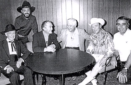 (L-R) Tim McCoy, record producer and collector Snuff Garrett, Kirk Alyn, Monte Hale, Roy Rogers and Tom Snyder. The group was together for Tom Snyder’s NBC late night talk show “Tomorrow” on November 28, 1977. 