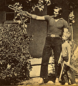 Clint Walker and daughter Valerie plan for some remodeling of their San Fernando Valley home in late 1957. 