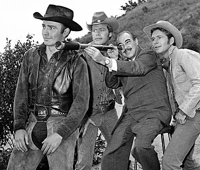James Drury, Doug McClure, Gary Clarke with ?? 
Who is that man with the telescope?