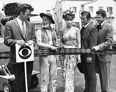 A CBS ribbon cutting for ??? with Clint Eastwood and Paul Brinegar of “Rawhide”, Tina Louise of “Gilligan’s Island”, and Robert Conrad and Ross Martin of 
“Wild Wild West”. (Thanx to Terry Cutts.) 