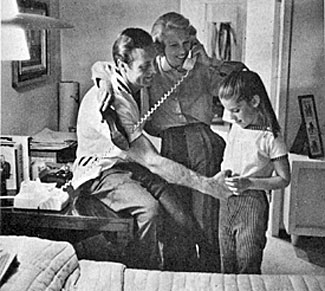 At home in 1957 with George Montgomery, Dinah Shore and their daughter Missy.
