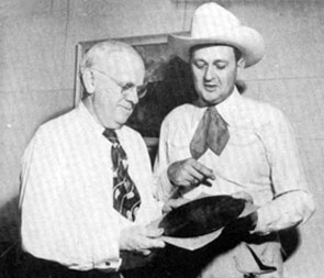 Bill “Cowboy Rambler” Boyd presents a copy of his “New Fort Worth Rag” to Fort Worth Mayor Deen circa 1947. 