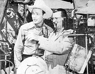 Director Frank McDonald discusses with Roy the next scene for “Along the Navajo Trail” (‘45 Republic). 