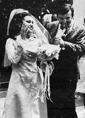 A shower of rice greets Phyllis and James Drury as they emerge from the Westwood Hills Christian Church on their wedding day April 27, 1968. 
