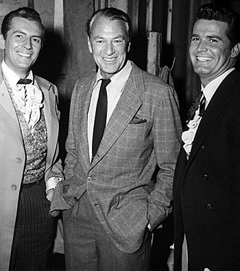 Gary Cooper visits those “Maverick” brothers, Jack Kelly and James Garner, 
on the Warner Bros. lot. (Thanx to Terry Cutts.)