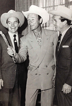 Roy Rogers with the famed Australian singing duo The LeGarde Twins. 

