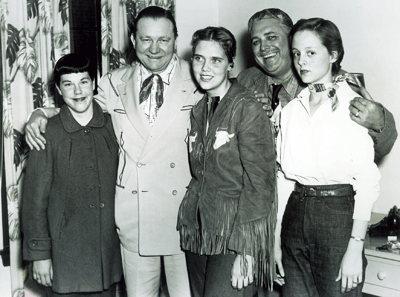 Tex Ritter meets members of Dodge City, Kansas 4-H Clubs in 1956. 

