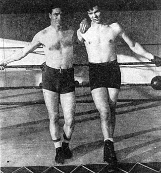 Tom Mix and fighter Jack Dempsey after boxing four fast rounds. Circa early ‘30s. 