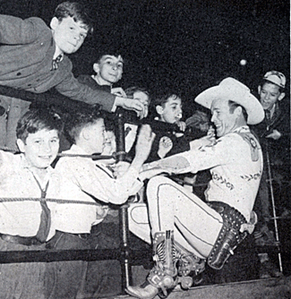 Roy gives a performance for crippled children at the World’s Championship Rodeo in Madison Square Garden.