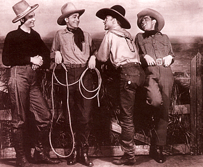 Tex Ritter on Broadway in “Green Grow the Lilacs” (1931). (L-R) H. Bailey, Tex Ritter, Hank Worden, Judd Carvell.