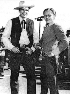 Tom Tryon (“Texas John Slaughter”) and Jan Merlin (“The Rough Riders”) pose for publicity at a charity event. 