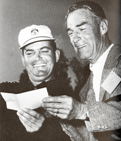 Randolph Scott presents Lionel Hebert his check upon winning the 1958 Tucson 
Open Golf Tournament. 