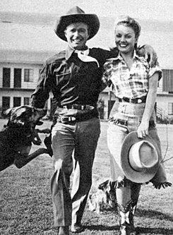 Don “Red” Barry and costar Lynn Merrick on the Republic backlot.