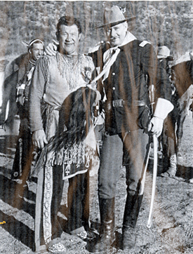 Jim Thorpe and Monte Blue in costume, ready for action, in Dick Foran's “Treachery Rides the Range” (‘36 Warner Bros.) 