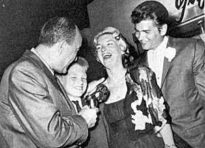 Being interviewed in 1960 by KDES radio in Palm Springs: Michael Landon with wife 
Dody and stepson Mark. 
