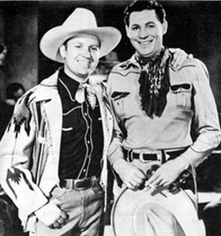 Gene Autry meets Jack Randall. Note the cigarette in Jack’s hand.