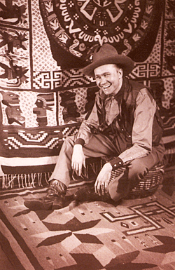 Tex Ritter relaxes at home. 