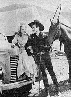 Universal star Johnny Mack Brown and Nell O’Day in 1939 beside a new Nash furnished by Universal. Probably publicity for “Boss of Bullion City”.