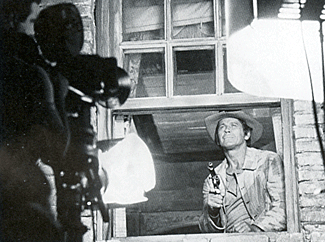 While seemingly the exterior of the hotel room window in broad daylight, this close-up of Charles Bronson shooting a man atop the clock tower across the street for "Once Upon a Time in the West" was actually filmed in the studio. 