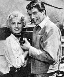 Robert Horton with "Wagon Train" guest star Barbara Stanwyck. 