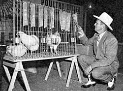 Gene Autry examines some fair exhibits in Springfield, OH. 