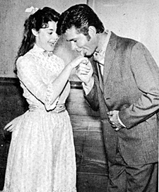 No, No, Gary. You kiss the hand of a lady, not lick it! "Virginian" stars Roberta Shore and Gary Clarke.