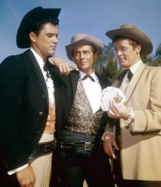 Brother Bart Maverick (Jack Kelly) and Cousin Beau Maverick (Roger Moore) introduce Robert Colbert as brother Brent Maverick to the
famed "Maverick" TV series. 