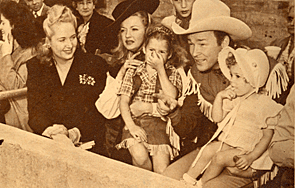 Roy Rogers and Dale Evans at the Roy Rogers Rodeo in July 1945. With them are Roy's wife Arline, Cheryl and Linda Lou. 