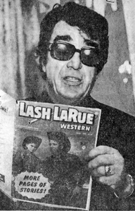 Lash LaRue checks out one of his comic books at the third annual Western Film Festival at the Peabody Hotel in Memphis, TN, on July 31, 1974. 