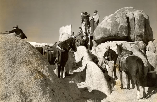 Amidst the Alabama Hills of Lone Pine, an RKO crew prepares to film a scene with badman Harry Woods atop the rocks on the left for James Warren's “Sunset Pass” (‘46).
