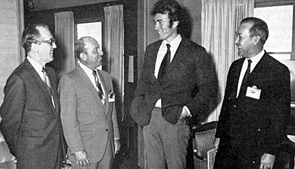 Clint Eastwood, Show-A-Rama's Male Star of the Year, chats at the Kansas City convention with various theater owners.
