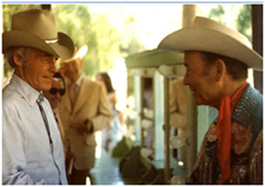 Guy Madison and Roy Rogers stop to chat during a photo shoot on the Warner Bros. lot in 1981. Note Pedro Gonzales Gonzales and Rex Allen in the background. (Thanks to Don Maris and Earl Blair.)