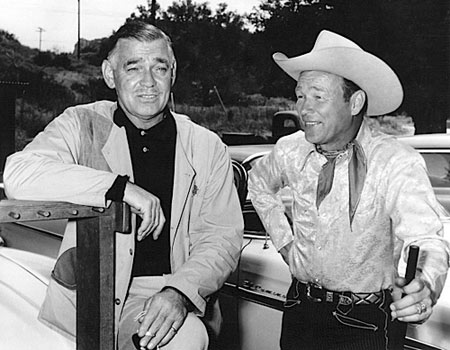 Roy Rogers and Clark Gable when Roy purchased Gable’s Pigeon grade Model 12 shotgun. Story is, Gable was having a bad day at the trap field, so as he came off the field he held up the shotgun and begged someone to make an offer for the SOB shotgun. Roy quickly responded and bought the gun for $600. He promptly went out and shot 50 clays in a row and from that day on he didn’t bother with another shotgun.