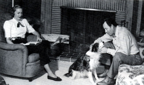 Bill Elliott at his Malibu Colony beach home in 1947 with his wife Helen and dog Sister. 