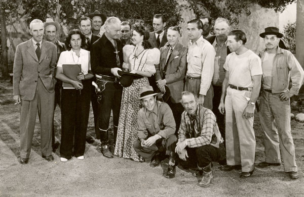 Partial cast and crew for the Hopalong Cassidy western “Bar 20” (‘43). That's Hoppy with leading lady Dustine Farnum (daughter of Dustin Farnum) and of course Andy Clyde kneeling in front. Rest of the group is unidentified. Can anyone help with any IDs? 