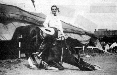 Tom Mix and Tony perform one of their numerous tricks on the grounds of Tom’s circus.