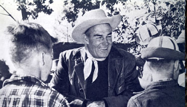 Randolph Scott with some young fans in 1955.
