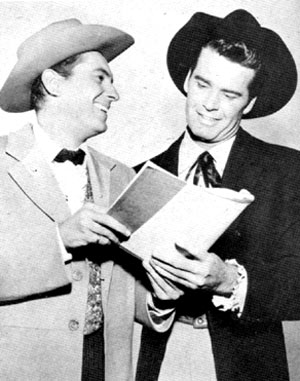 The “Maverick” brothers, Jack Kelly and James Garner, chuckle over their latest script.