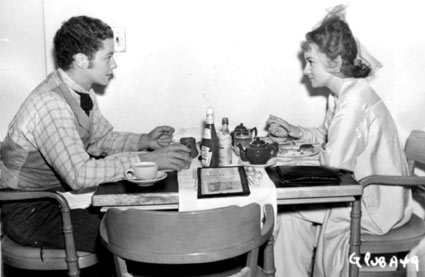 A young pre-war Tim Holt lunches with actress Ann Shirley in the RKO commissary.