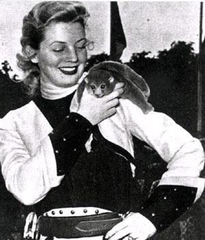 Gail (“Annie Oakley”) Davis poses at the London Zoo with a ??? (Thanx to Terry Cutts.)