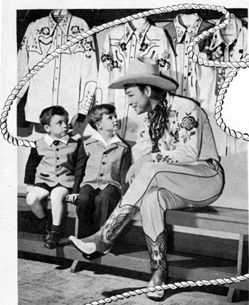 Roy Rogers poses with two young boys for a publicity picture in the mid-‘40s at Bloomingdale’s in New York.
