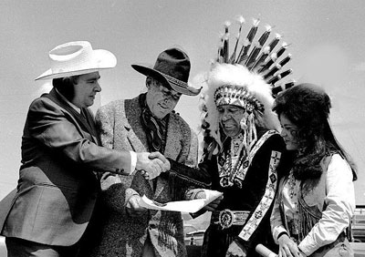 Cartoonist Max Harrison presents a Kentucy Colonel certificate to Ken Maynard and Wild Bill Cody as Cody’s wife Genevieve Stockhauser looks on.