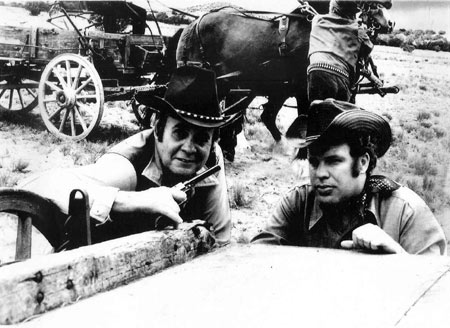 Sunset Carson and Jerry Whittington in action for “Marshal of Windy Hollow”. (Lee Hysinger in the background.)
