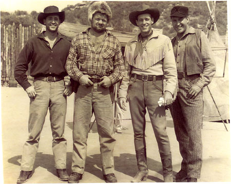 In-between scenes for “Wild Bill Hickok: Mountain Men” are (L-R) Wayne Mallory, Henry Kulky, Guy Madison, Paul Sorensen. Mallory is Madison’s stuntman/actor brother.