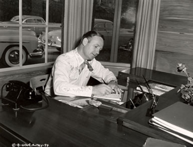 Gene Autry at his home office in 1949. Gene’s desk is now a proud possession of Boyd and Donna Magers and WESTERN CLIPPINGS.