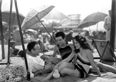 Taking a break at the beach in the ‘30s are director Sam Wood, Johnny Mack Brown and Norma Shearer. (Thanx to Jerry Whittington.)