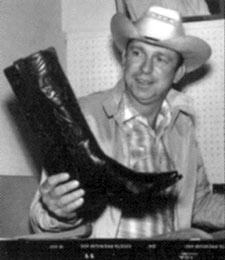 Slim Pickens admires his new Lucchese boots, circa mid-‘50s.