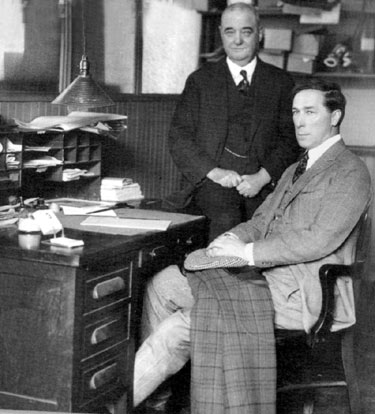 William S. Hart sits with former western lawman Bat Masterson at Masterson’s desk at the NEW YORK MORNING TELEGRAPH office on October 7, 1921. Masterson died eighteen days after this photo was taken.