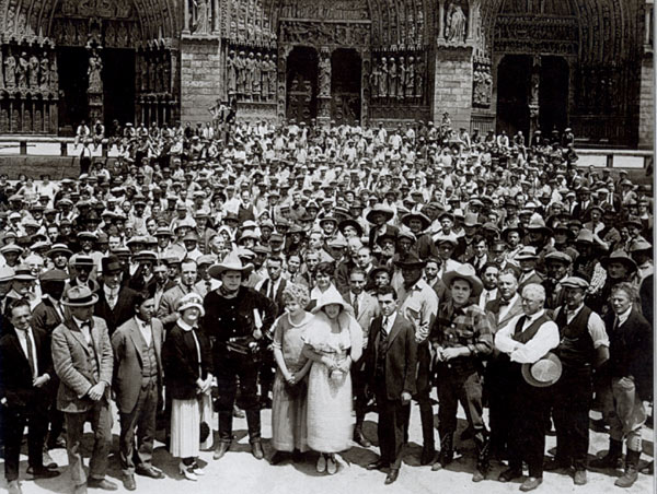 Promotional photo taken circa 1924 spotlighting Universal’s Blue Streak Players, the studio’s top boxoffice draws of the day. In the front row you’ll notice Jack Hoxie and Hoot Gibson. Can anyone identify any of the other cowboys? The players pose in front of the great doors of the Notre Dame cathedral facade which was used in “Hunchback of Notre Dame” and Tom Mix’s “My Pal the King”. (Courtesy Richard Bann.)